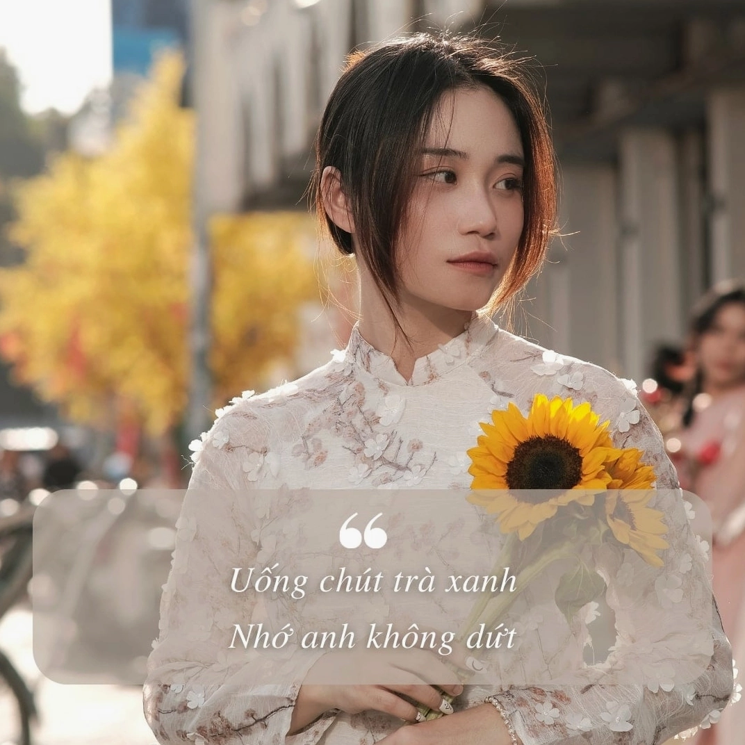 Gái xinh mặc áo dài tết với nụ cười quyến rũ đầy lôi cuốn khiến bao trái tim xao xuyến