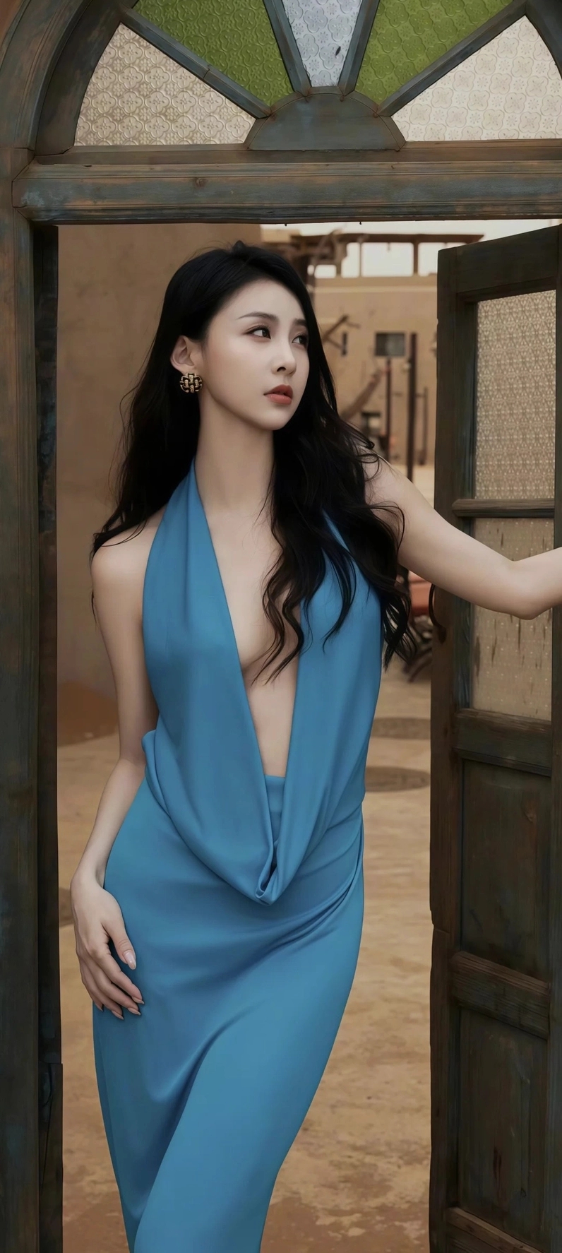 Mỹ nữ diện váy lụa mỏng manh gợi cảm thả dáng lả lơi trên chiếc ghế sô pha sang trọng