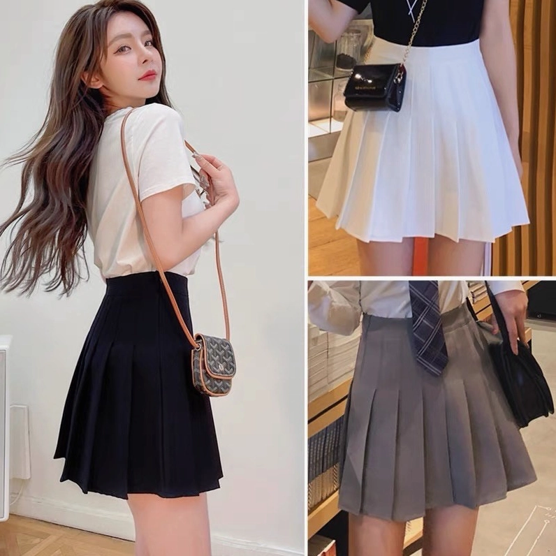 Phối đồ mùa đông cực chất với chân váy xếp ly và áo len ấm áp