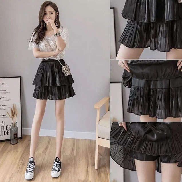 Phong cách công sở thanh lịch và hiện đại với chân váy xếp ly tối màu